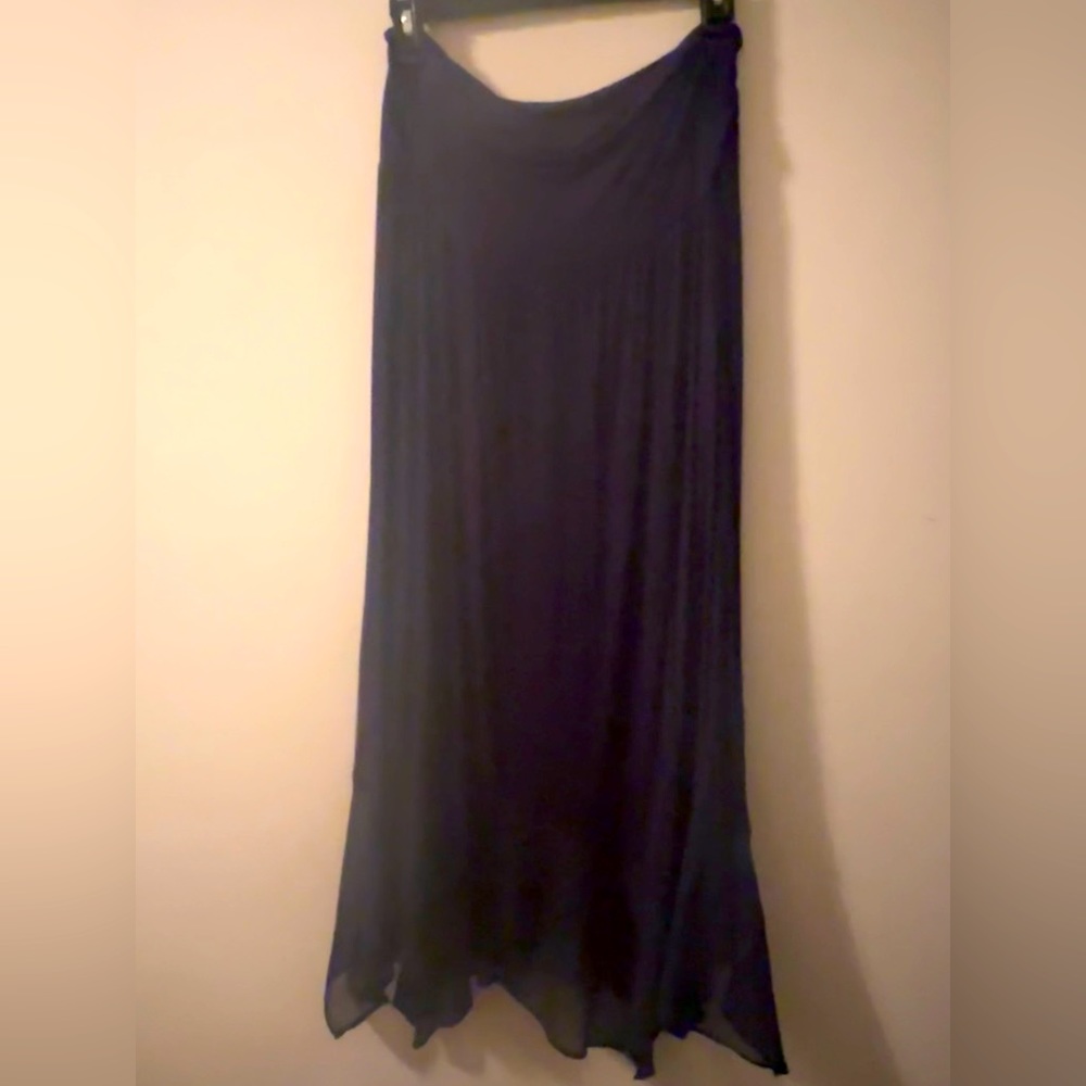 Long navy blue maxi skirt. Bottom is sheer.